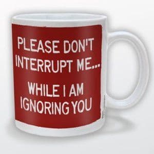 "Don't Interrupt Me" Mug