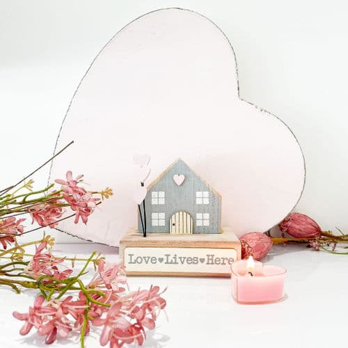 Love Lives Here Cosy Wooden Cottage