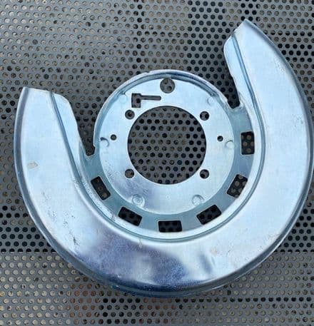 1965-1975  LH Rear Brake plate SHIELD GM 5465983 , New. Silver  Fits 1976-1982  too