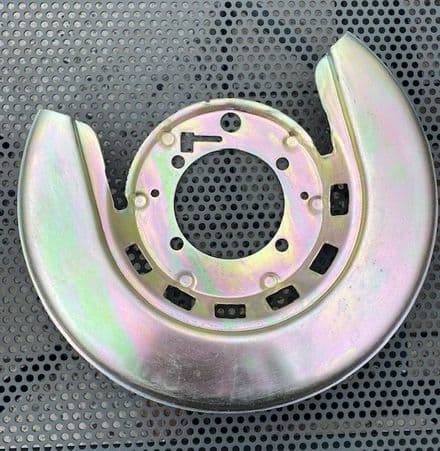1976-1982  LH Rear Brake plate SHIELD GM 5465983 , New. Gold Passivate . Fits 1965-1975 too