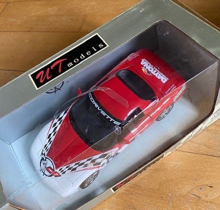 NEW  Unopened  UT Models  1999 CORVETTE  C5  DAYTONA  PACE CAR  in RED   1/18 scale 39949 UT 0597